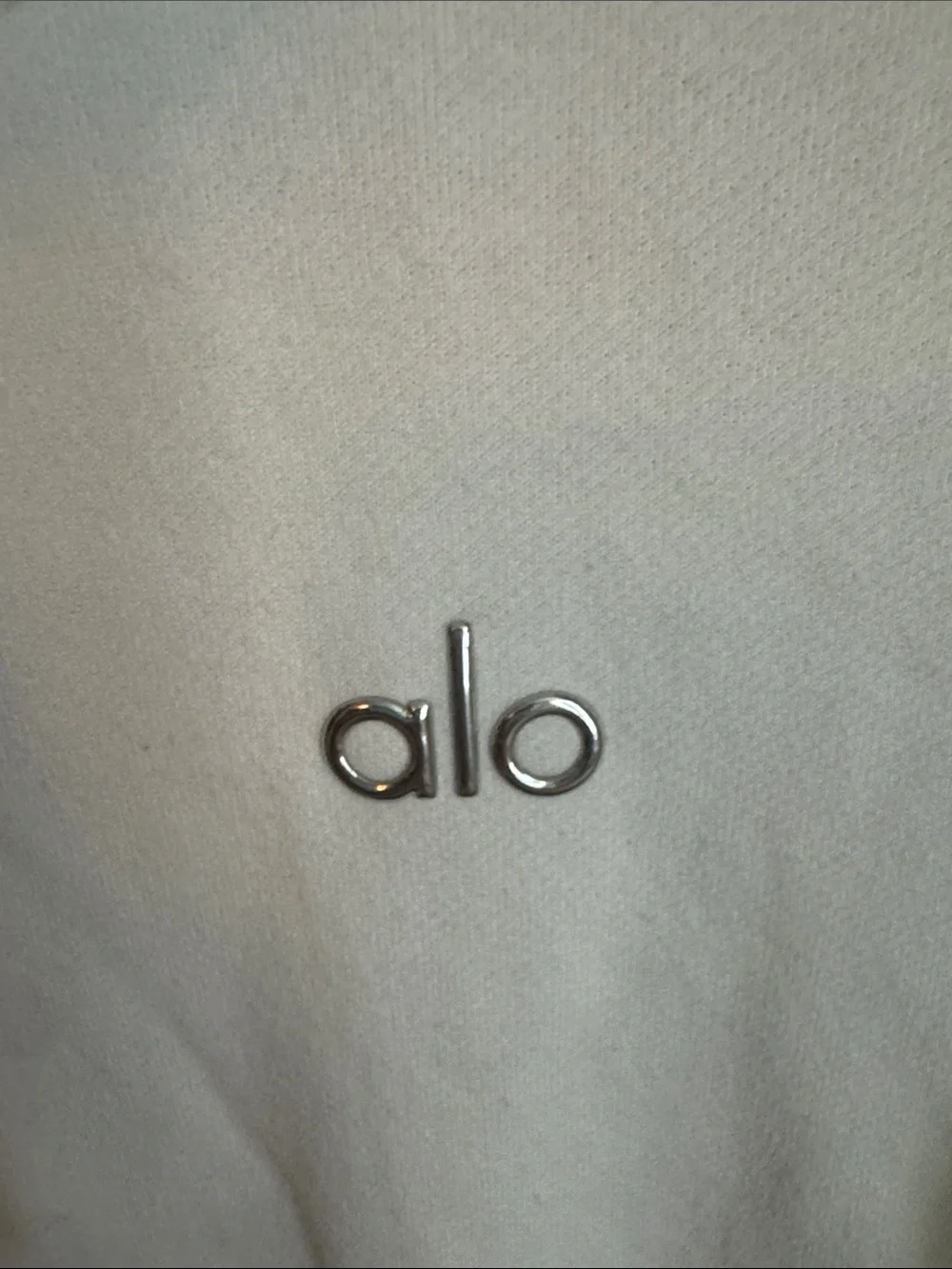 Alo White Cozy Hoodie with matching sweatpants.